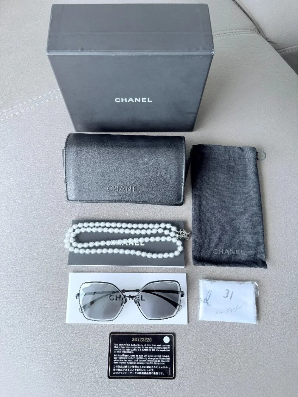 Chanel Butterfly Sunglasses featuring a removable pearl chain